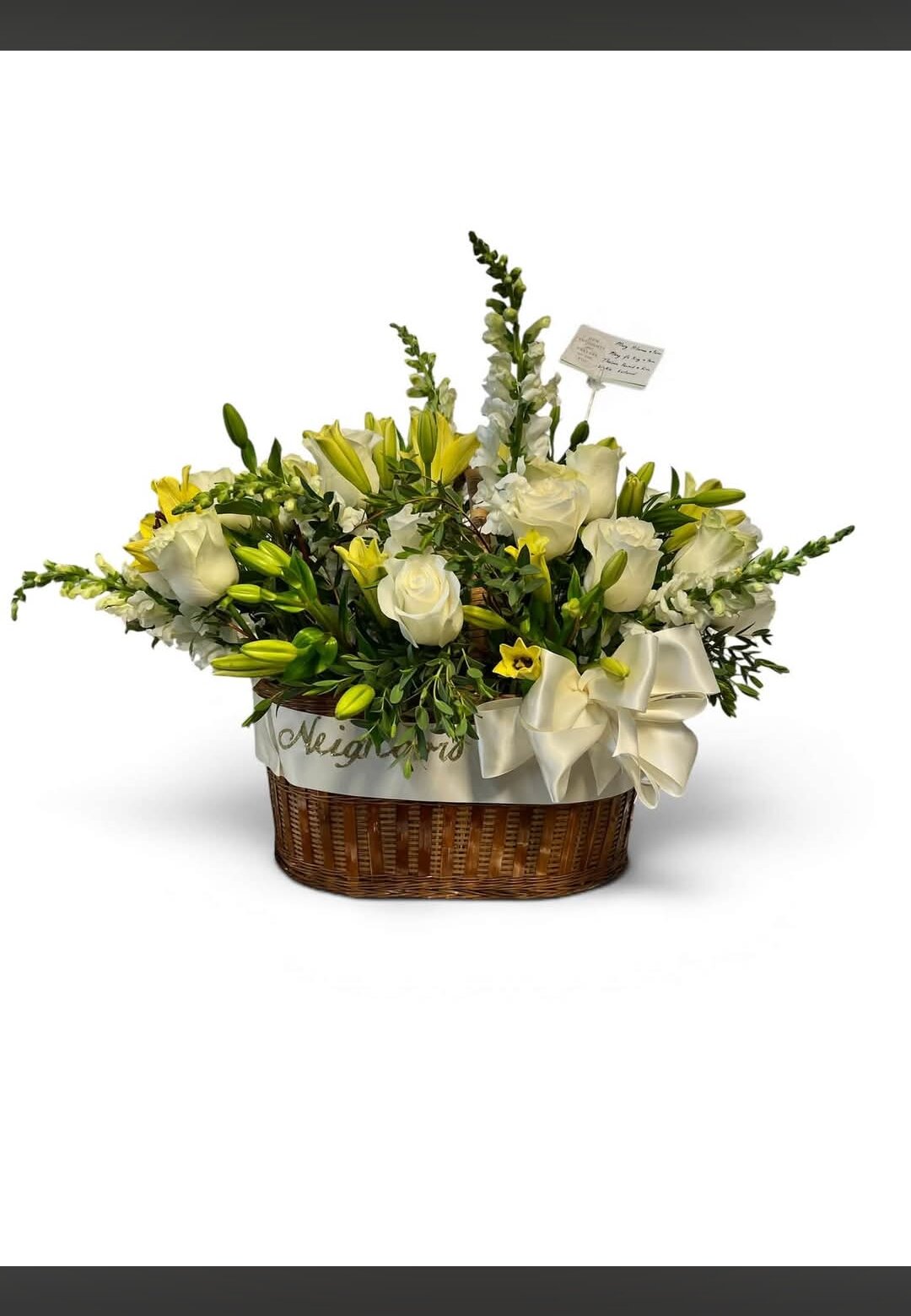 White arrangement in a wooden box