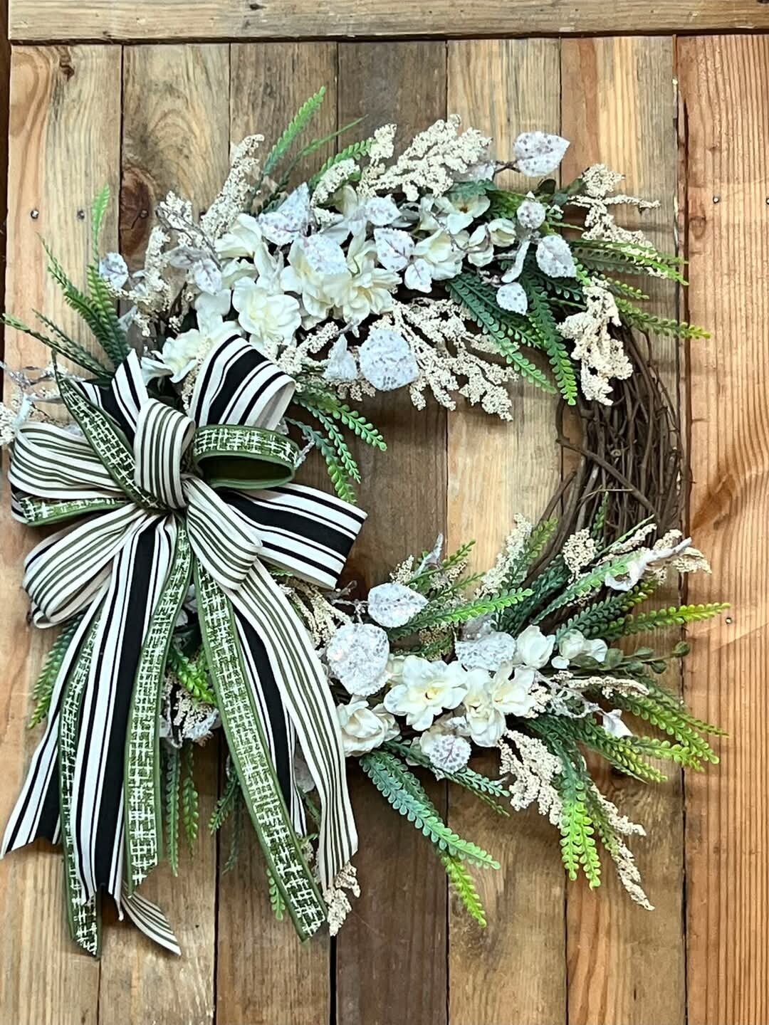 Handmade wreath with white blooms
